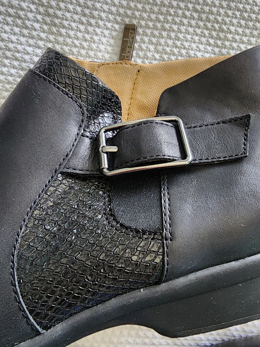Dansko black leather ankle Boots with side buckle and textured panel